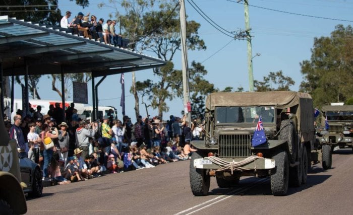 ANZAC military vehicles displayed with Australian flags at Wangi RSL commemoration